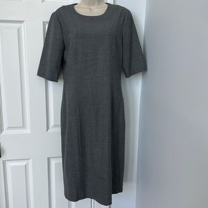 Beautiful grey classic wool dress, hits at knee.